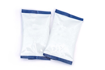 Paper packet isolated on white background, blank bag package, Close up silica gel or desiccant