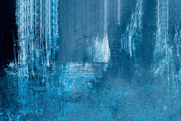 Grain blue paint wall background or texture