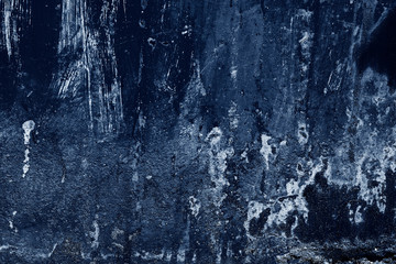 Grain blue paint wall background or texture