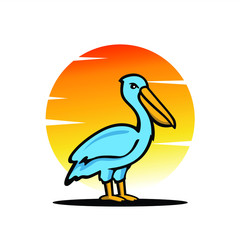 View of pelicans on the edge of the sunset beach