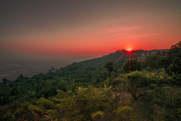 abstract background of nature,a high angle that can see the scenery around (trees,meadows,mountains, the light of the twilight in the evening) and the wind blowing through the large mountains