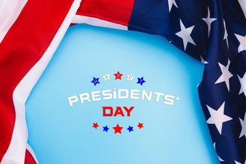 Happy Presidents' Day typography over blue background with US American flag border