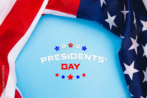 Happy Presidents' Day typography over blue background with US American flag border
