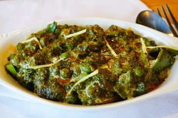 A spinach dish of saag paneer at an Indian restaurant
