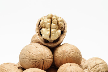 Fototapeta na wymiar close up of dried walnuts on white background