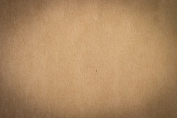 Brown paper, craft abstract background. Retro, old antique vintage paper art pattern texture background. Detail paperboard texture of pattern with free space copy for text, vignette effect.