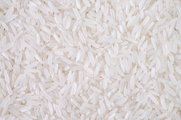Close-up of white rice seed texture background. Organic, natural long rice grain, food for healthy. Agriculture of culture asian. Top view