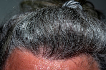 long gray hair in a bun