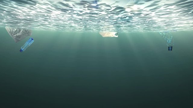 Old plastic bottle floating down in seabed underwater with concept environmentally friendly ., 4K video