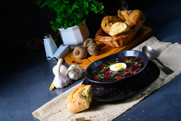 Delicious beetroot borscht with egg
