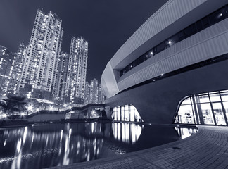 Modern architecture in Park and high rise residential building in Hong Kong city at night