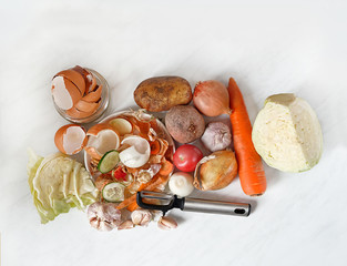 Food waste concept. Organic waste Veggies and Spices on kitchen table. Composting fruits and...
