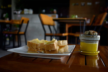 Butter toast topped with sweetened condensed milk