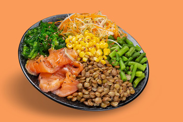 bowl with wholesome diet food, healthy lifestyle concept, vegetables, kenua porridge, and fish, bowl levitate