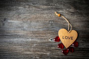 Wooden background with hearts for Valentine's day. Red and white hearts