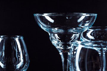 Empty  glasses for drinks on dark background