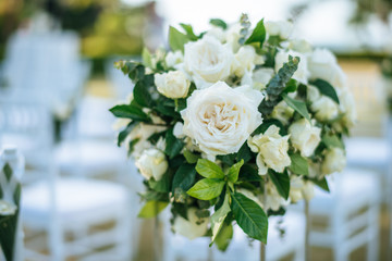 Wedding ceremony. decorated with flowers on the lawn.