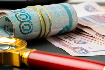 Magnifying Glass on the Russian Currency Rubles