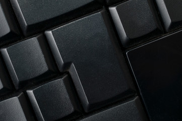 Blank keys on a black computer keyboard