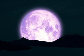 Fototapeta na wymiar Full Snow Moon on night sky back silhouette island in the ocean night sky