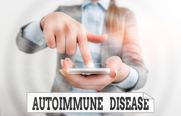 Conceptual hand writing showing Autoimmune Disease. Concept meaning body tissues are attacked by...