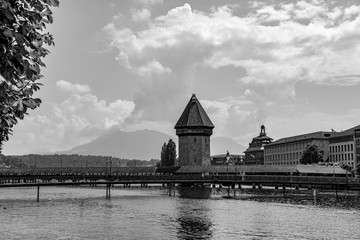 City of Lucerne with Bridge Tower in a Sunny Day in Switzerland.
