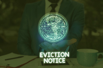 Writing note showing Eviction Notice. Business concept for an advance notice that someone must...