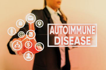 Writing note showing Autoimmune Disease. Business concept for body tissues are attacked by its own...