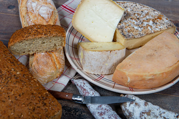 cheeses, sausage and Tomme de Savoie, Savoy, french Alps France.