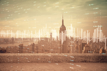 Fototapeta premium Forex graph on city view with skyscrapers background multi exposure. Financial analysis concept.