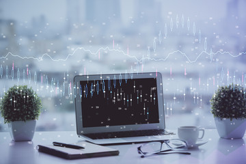 Stock market graph and table with computer background. Multi exposure. Concept of financial...