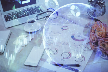 Financial market graph hologram and personal computer on background. Double exposure. Concept of forex.