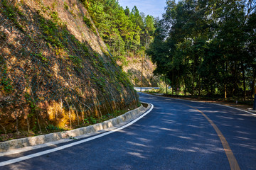Fototapeta premium Highway on a mountainside in suburban mountains