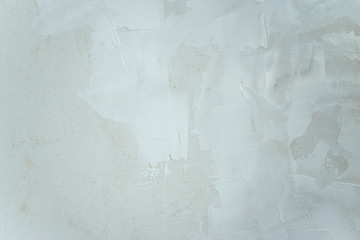 white wall with raw plaster