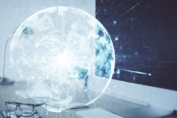 Multi exposure of business theme icons and work space with computer background. Concept of success.