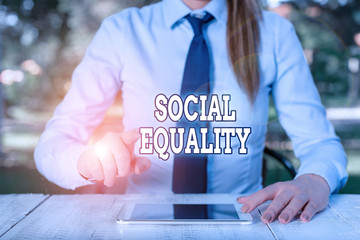 Conceptual hand writing showing Social Equality. Concept meaning applies concerns of justice and...