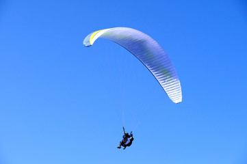 paraglider flying in the sky