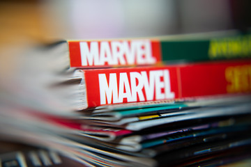 Naklejka premium Bangkok, Thailand - December 15, 2019: Marvel Comics logo on comic books.