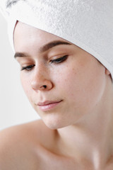 Young Woman with white Towels. Spa, skincare, beauty, cosmetics, wellness concept