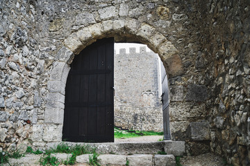 Fototapeta na wymiar Sesimbra castle ruins - gate leading to the interior courtyard of the ancient castle