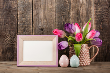 Easter decoration background with fresh tulips