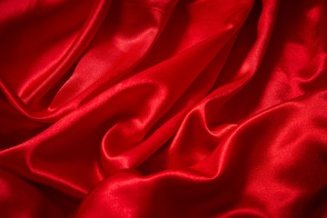 Luxury red satin smooth fabric background for celebration, ceremony, event invitation card or advertising poster