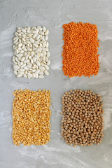 Pea, chickpeas, lentils, red beans and white beans. Square food flat lay, top view