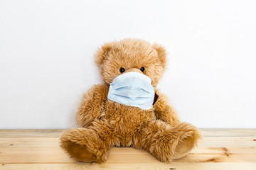 Bear sick, infection, virus, coronovirus, 2019-nCoV, toy bear sick, virus and cold mask, treatment of toys and people, epidemic