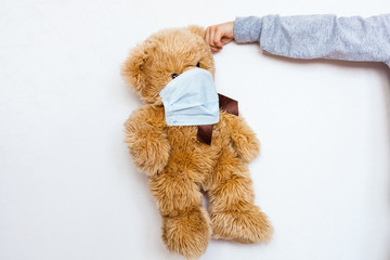 Bear sick, infection, virus, coronovirus, 2019-nCoV, toy bear sick, virus and cold mask, treatment of toys and people, epidemic