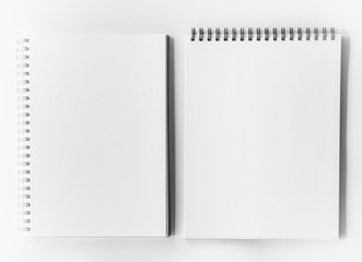 opened blank square ctalogue at white design paper background.