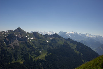 Obraz premium view over swiss mountains on a sunny day