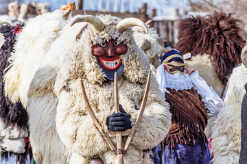 Unidentified people in masks; participants at the Mohacsi Busojaras, it is a carnival for spring...