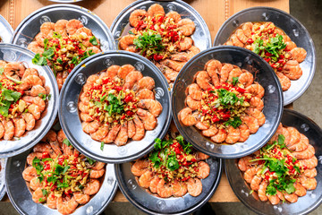 Delicious chinese food poached shrimp,ingredients are coriander and garlic with chili,top view.