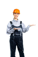 female engineer smiling and looking at camera. Shows with palms to the right. Isolated